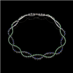 The blue sapphires and emeralds are intertwined together to give the wave appearance in this necklace