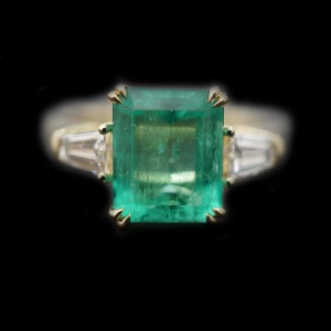Emerald and Tapered Baguette Diamond Ring